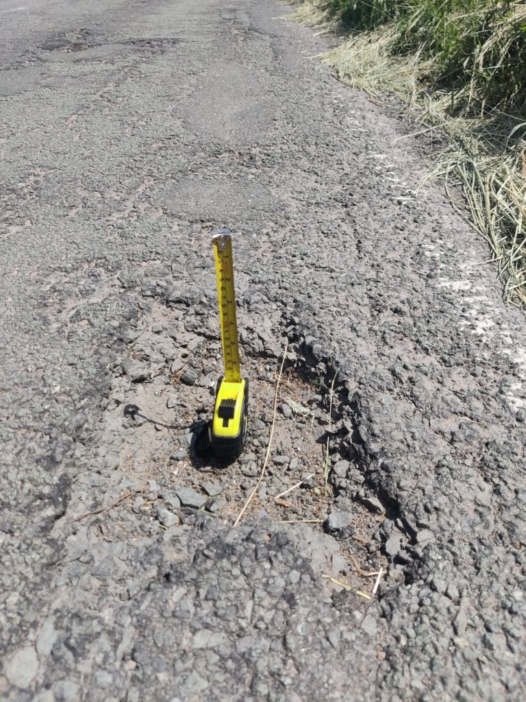 Pothole in road